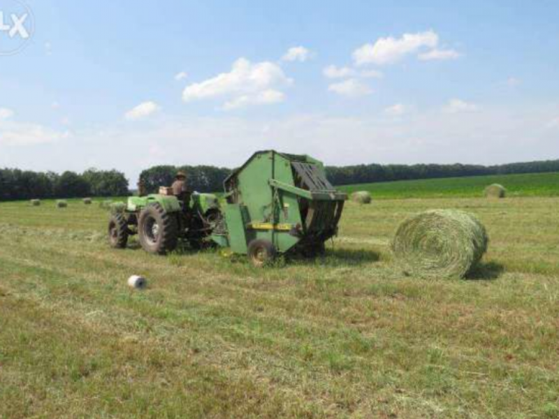 Rundballenpresse des Typs John Deere 410,  in Нова Одеса (Bild 1)