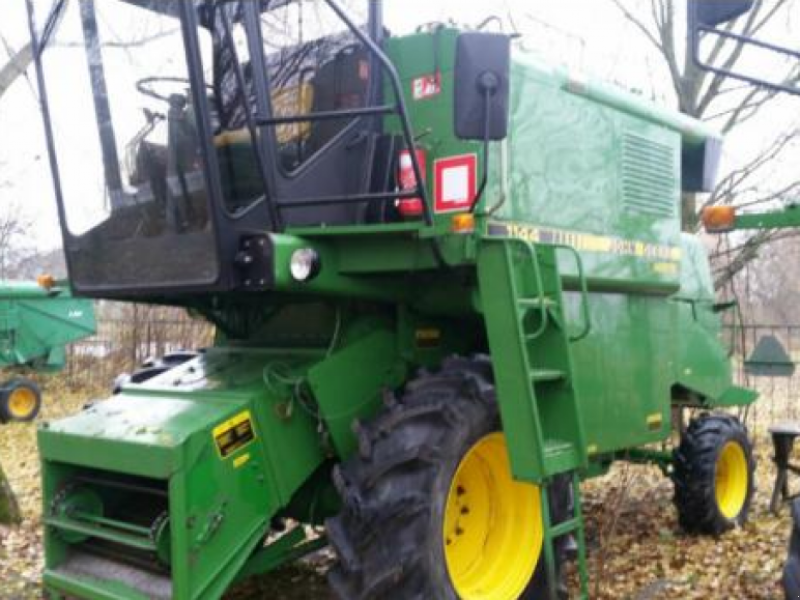 Oldtimer-Mähdrescher des Typs John Deere 1144, Neumaschine in Луцьк (Bild 1)