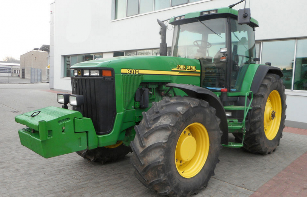 Oldtimer-Traktor des Typs John Deere 8310, Neumaschine in Хмельницький (Bild 2)