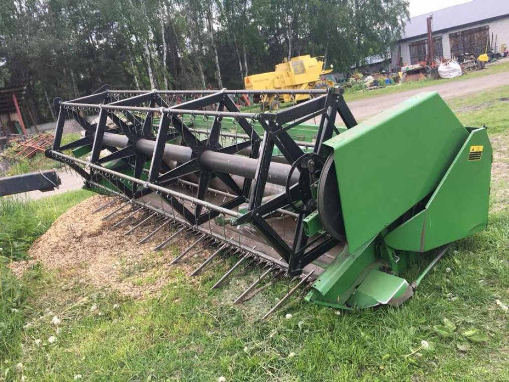 Oldtimer-Mähdrescher des Typs John Deere 1052, Neumaschine in Луцьк (Bild 4)