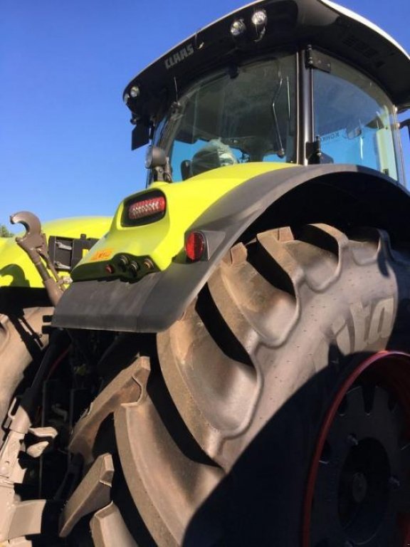 Oldtimer-Traktor des Typs CLAAS Axion 930, Neumaschine in Володарка (Bild 2)