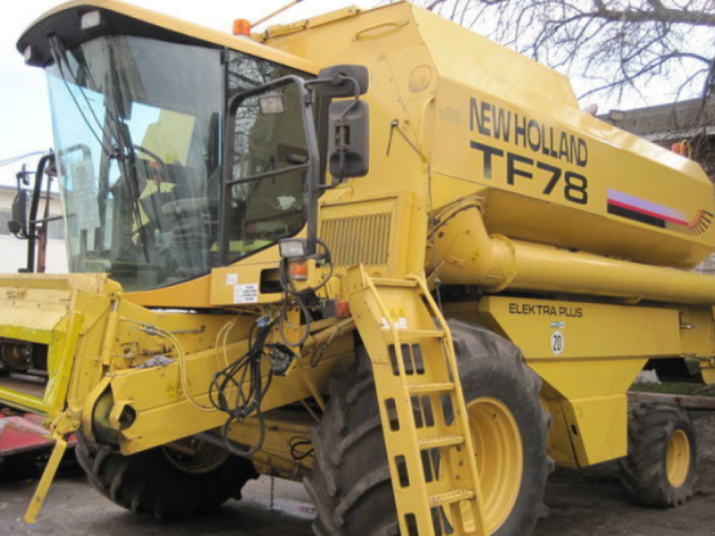 Oldtimer-Mähdrescher des Typs New Holland TF78, Neumaschine in Харків (Bild 1)
