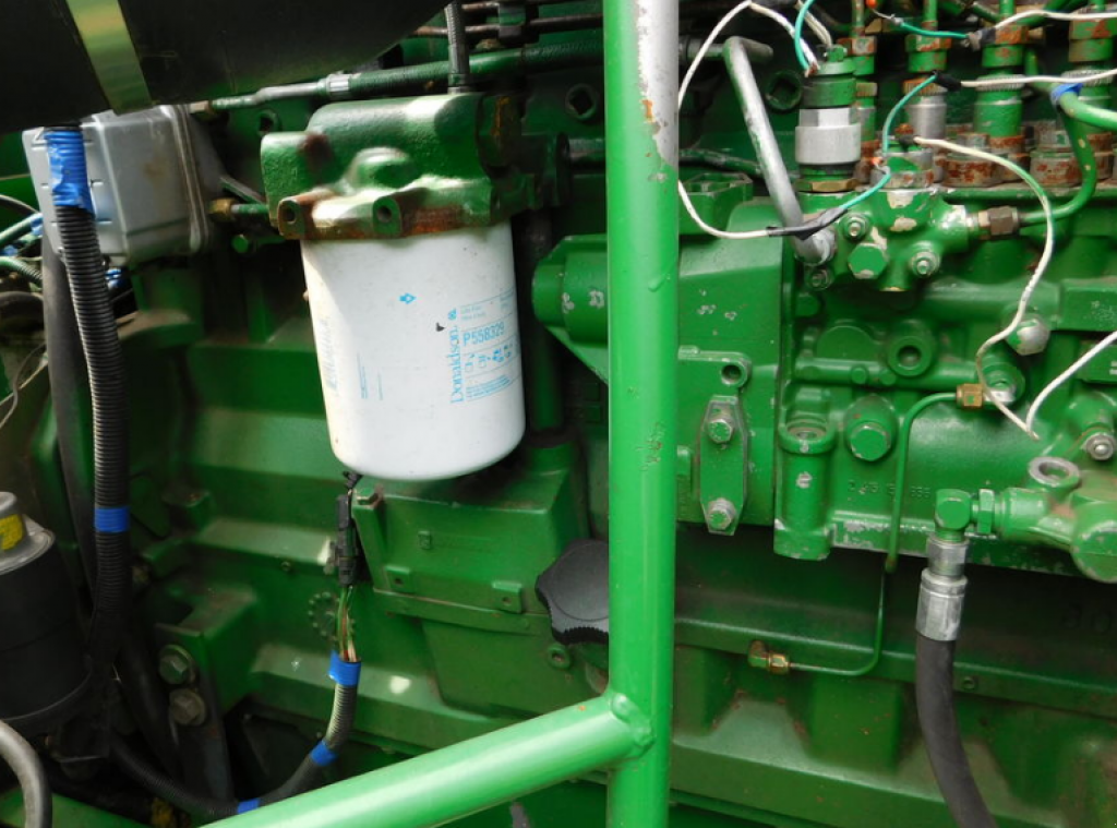 Oldtimer-Mähdrescher des Typs John Deere 9610, Neumaschine in Харків (Bild 9)