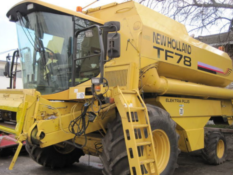 Oldtimer-Mähdrescher des Typs New Holland TF78, Neumaschine in Харків (Bild 1)