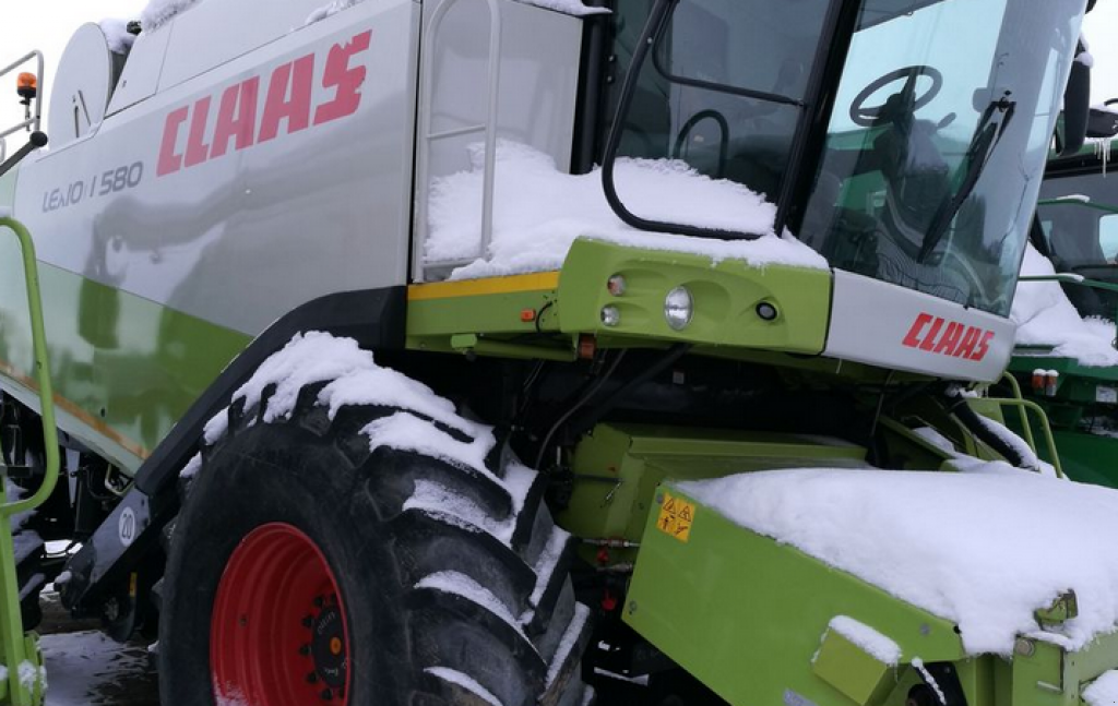 Oldtimer-Mähdrescher des Typs CLAAS Lexion 580+,  in Рівне (Bild 1)