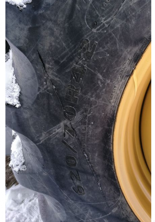 Oldtimer-Mähdrescher des Typs Caterpillar Lexion 570 W,  in Рівне (Bild 7)