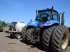 Oldtimer-Traktor des Typs New Holland T8040, Neumaschine in Куйбишеве (Bild 1)