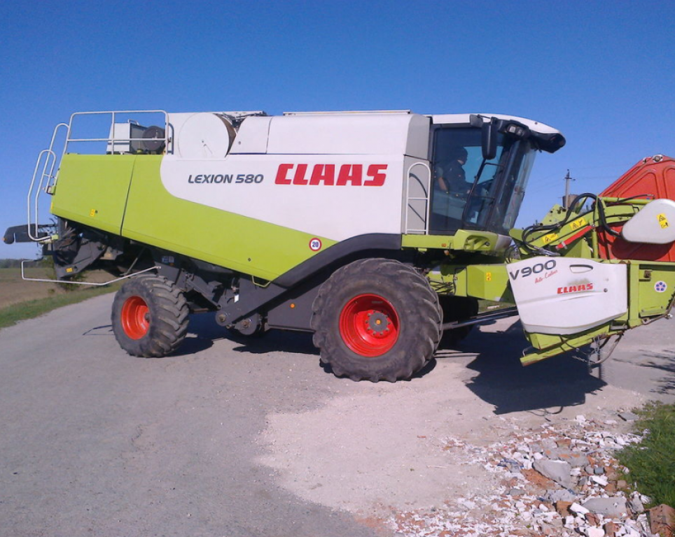 Oldtimer-Mähdrescher des Typs CLAAS Lexion 580, Neumaschine in Чортків (Bild 4)