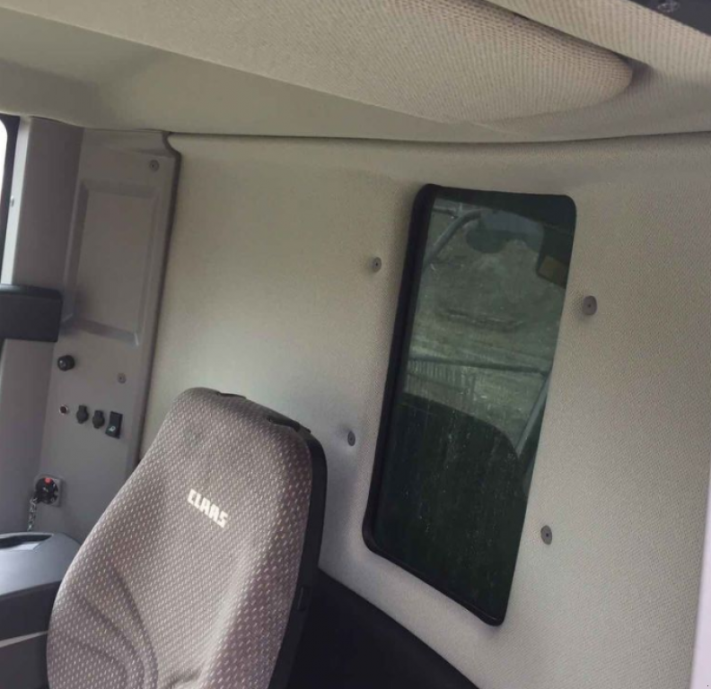 Oldtimer-Mähdrescher des Typs CLAAS Tucano 440, Neumaschine in Чортків (Bild 3)