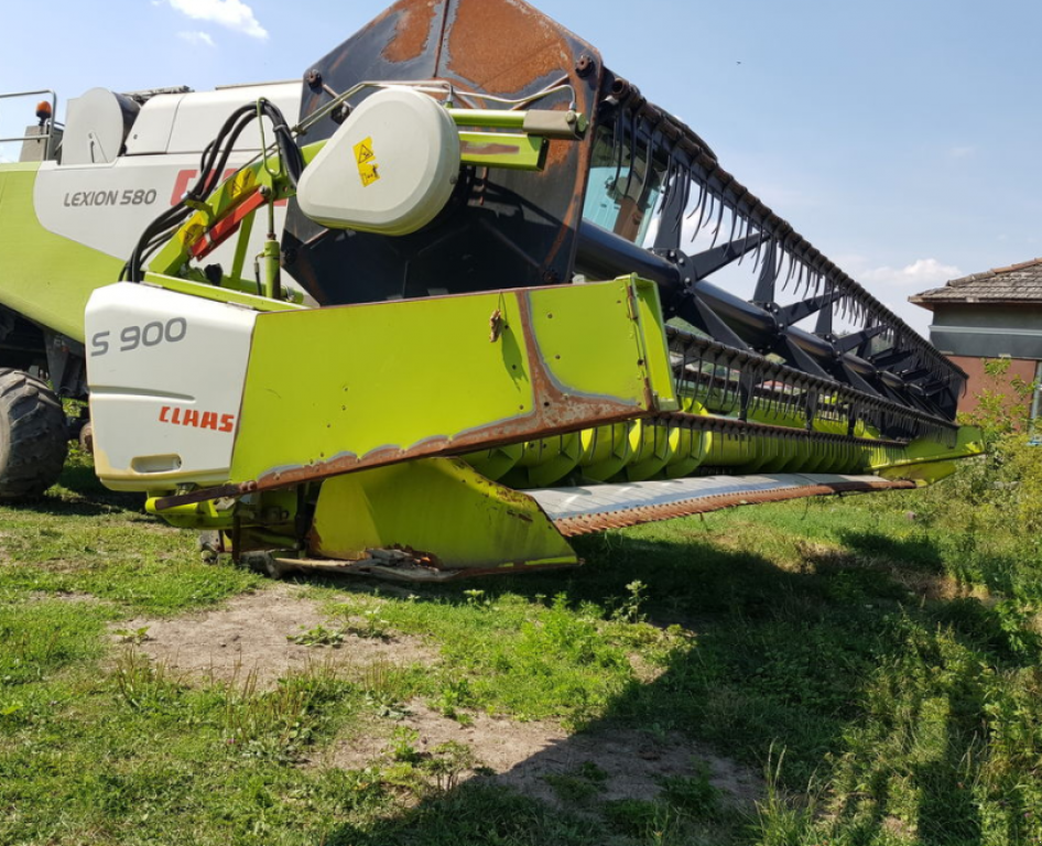 Oldtimer-Mähdrescher des Typs CLAAS Lexion 580, Neumaschine in Чортків (Bild 4)