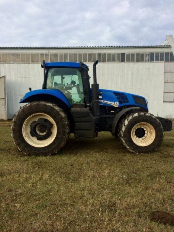 Oldtimer-Traktor des Typs New Holland T8.390, Neumaschine in Пологи (Bild 5)