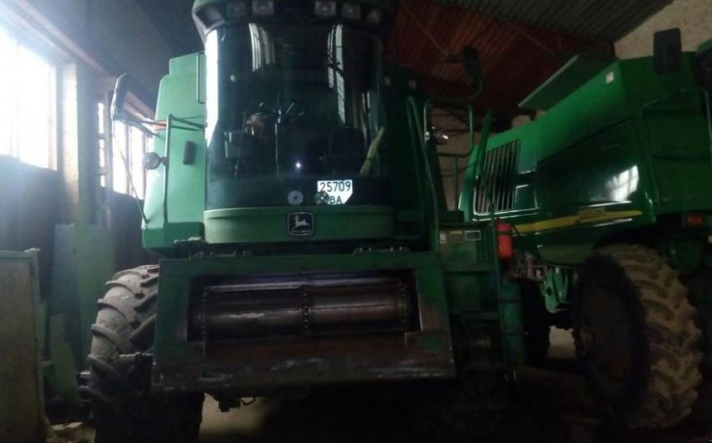 Oldtimer-Mähdrescher des Typs John Deere 9500, Neumaschine in Кіровоград (Bild 5)