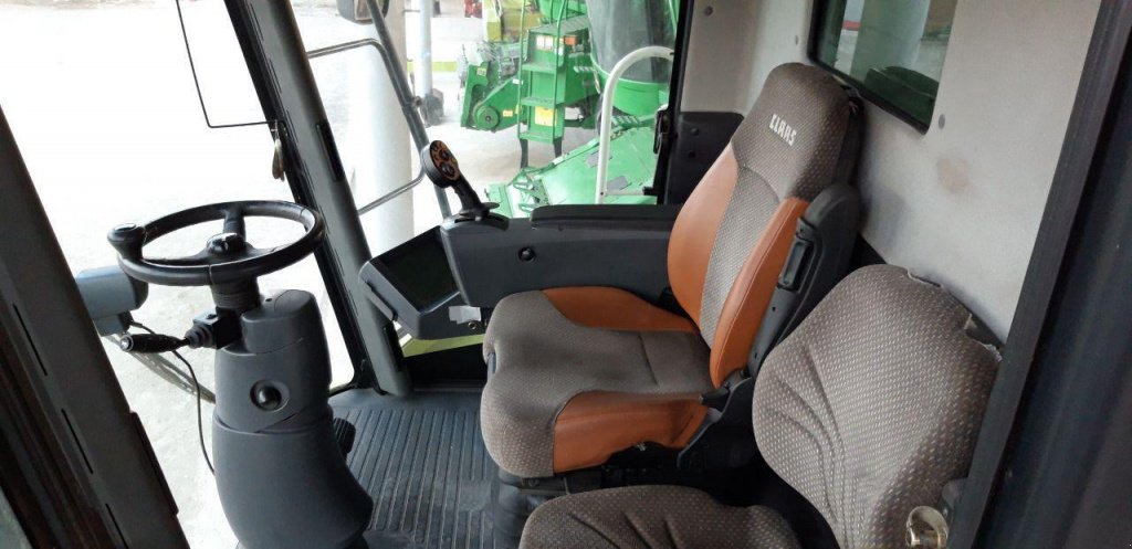 Oldtimer-Mähdrescher des Typs CLAAS Lexion 580, Neumaschine in Рівне (Bild 6)