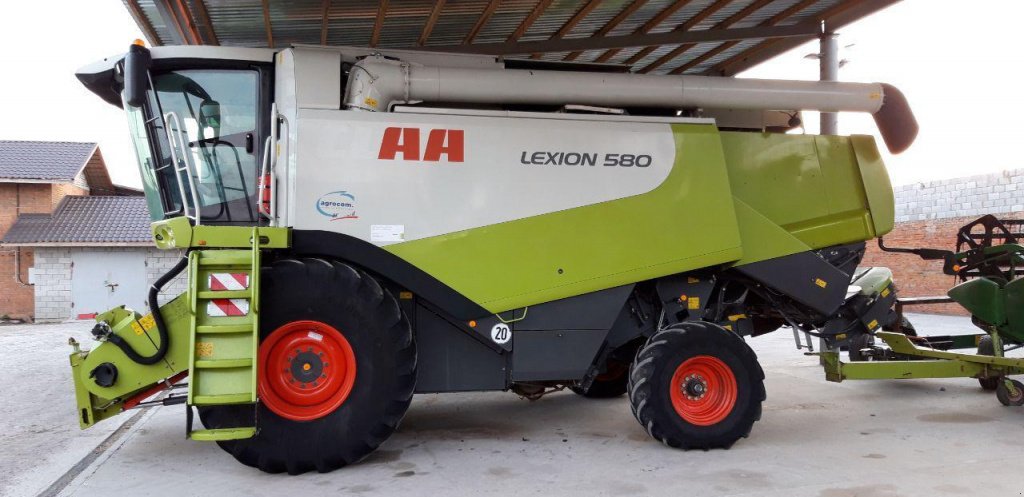 Oldtimer-Mähdrescher des Typs CLAAS Lexion 580, Neumaschine in Рівне (Bild 3)