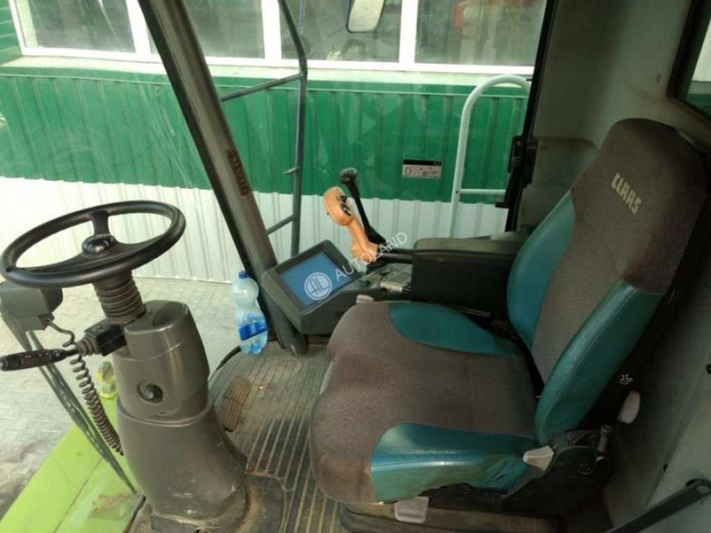 Oldtimer-Mähdrescher des Typs CLAAS Lexion 470, Neumaschine in Рівне (Bild 7)