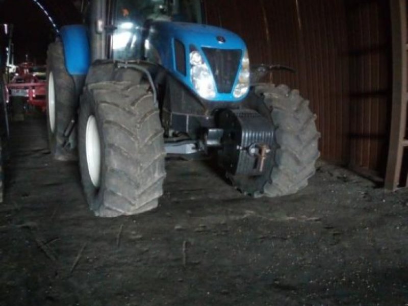 Oldtimer-Traktor des Typs New Holland T7060, Neumaschine in Дніпро (Bild 1)