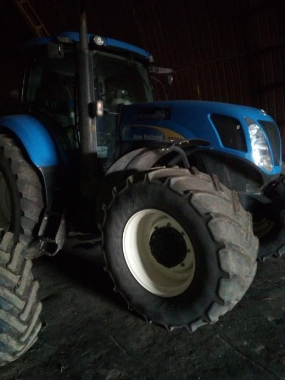 Oldtimer-Traktor des Typs New Holland T7060, Neumaschine in Дніпро (Bild 4)