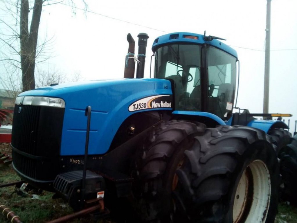 Oldtimer-Traktor des Typs New Holland T9060, Neumaschine in Запоріжжя (Bild 1)