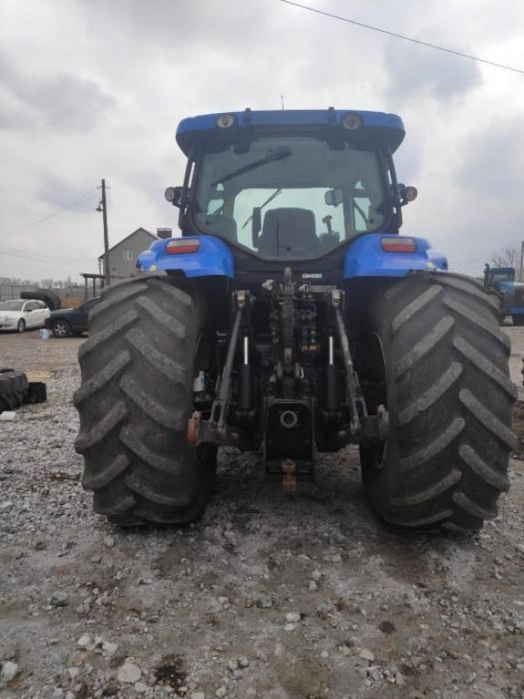 Oldtimer-Traktor des Typs New Holland T7040, Neumaschine in Дніпро (Bild 4)