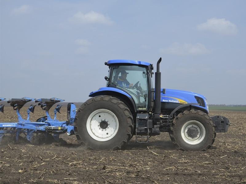 Oldtimer-Traktor des Typs New Holland T7060, Neumaschine in Хмельницький (Bild 1)
